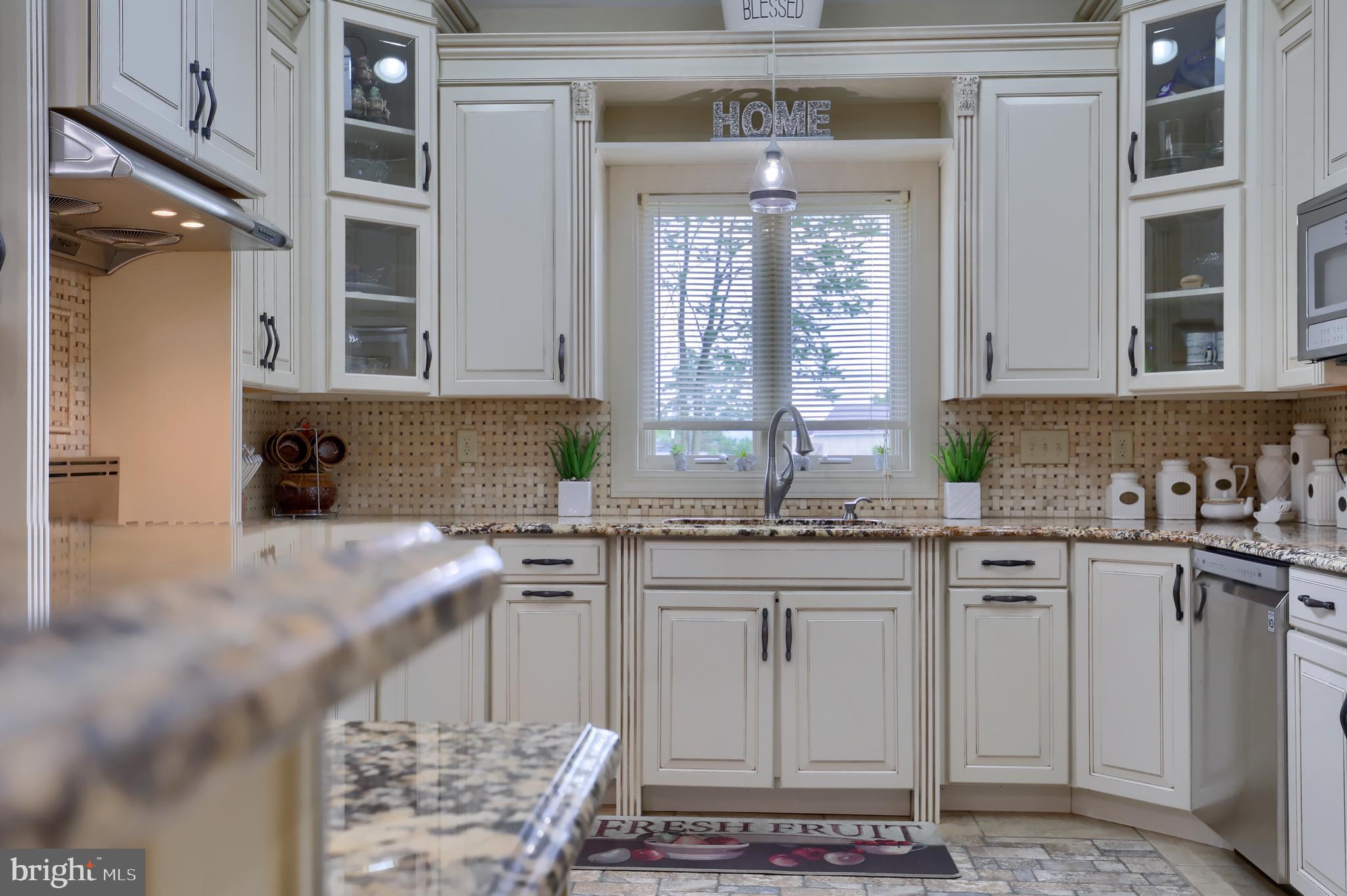 70 Horseshoe Trail Road Denver, PA 17517 - Photo 19 of 128 a kitchen with stainless steel appliances granite countertop a sink and cabinets