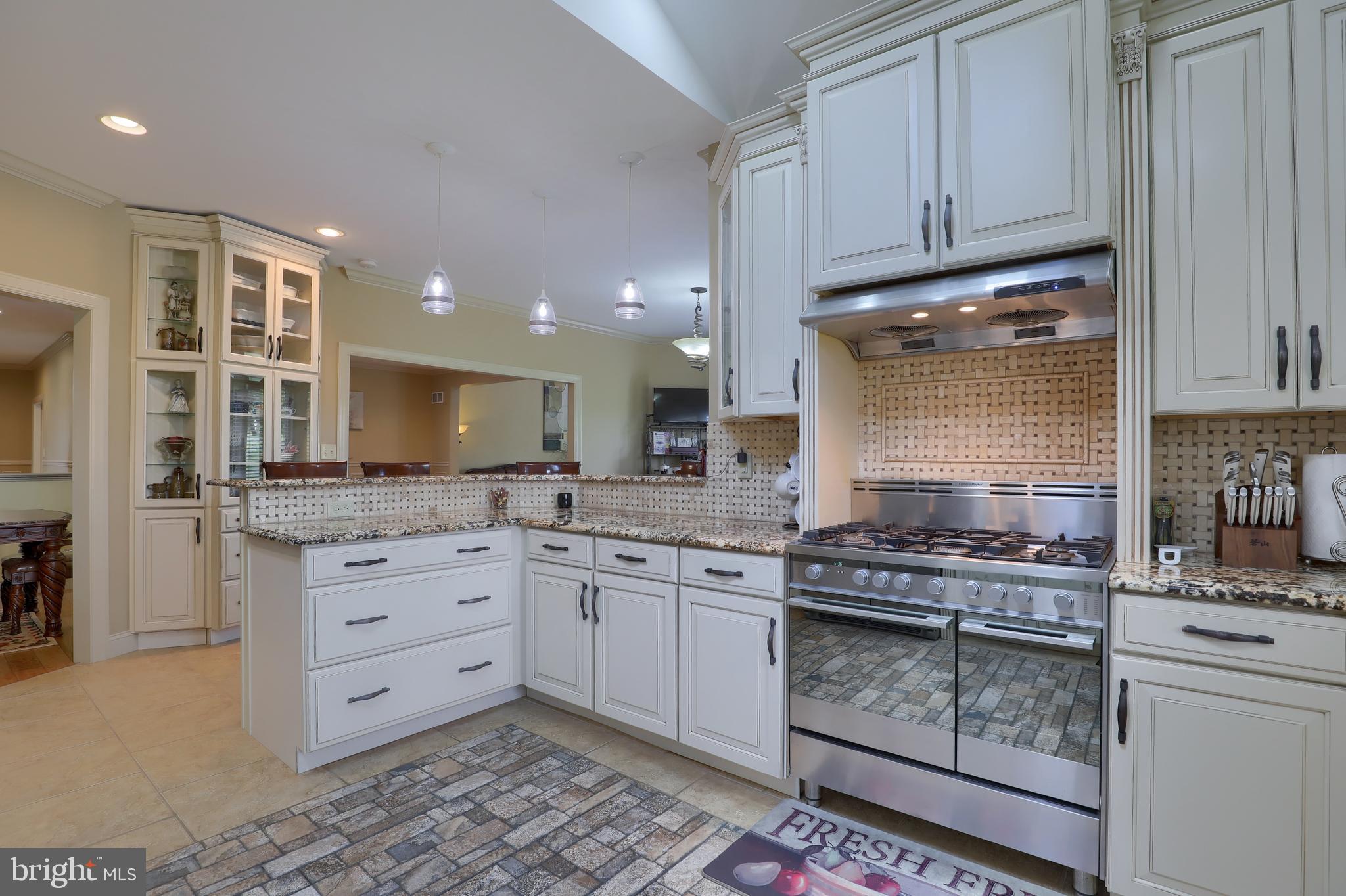 70 Horseshoe Trail Road Denver, PA 17517 - Photo 21 of 128 a kitchen with stainless steel appliances granite countertop a stove and a sink