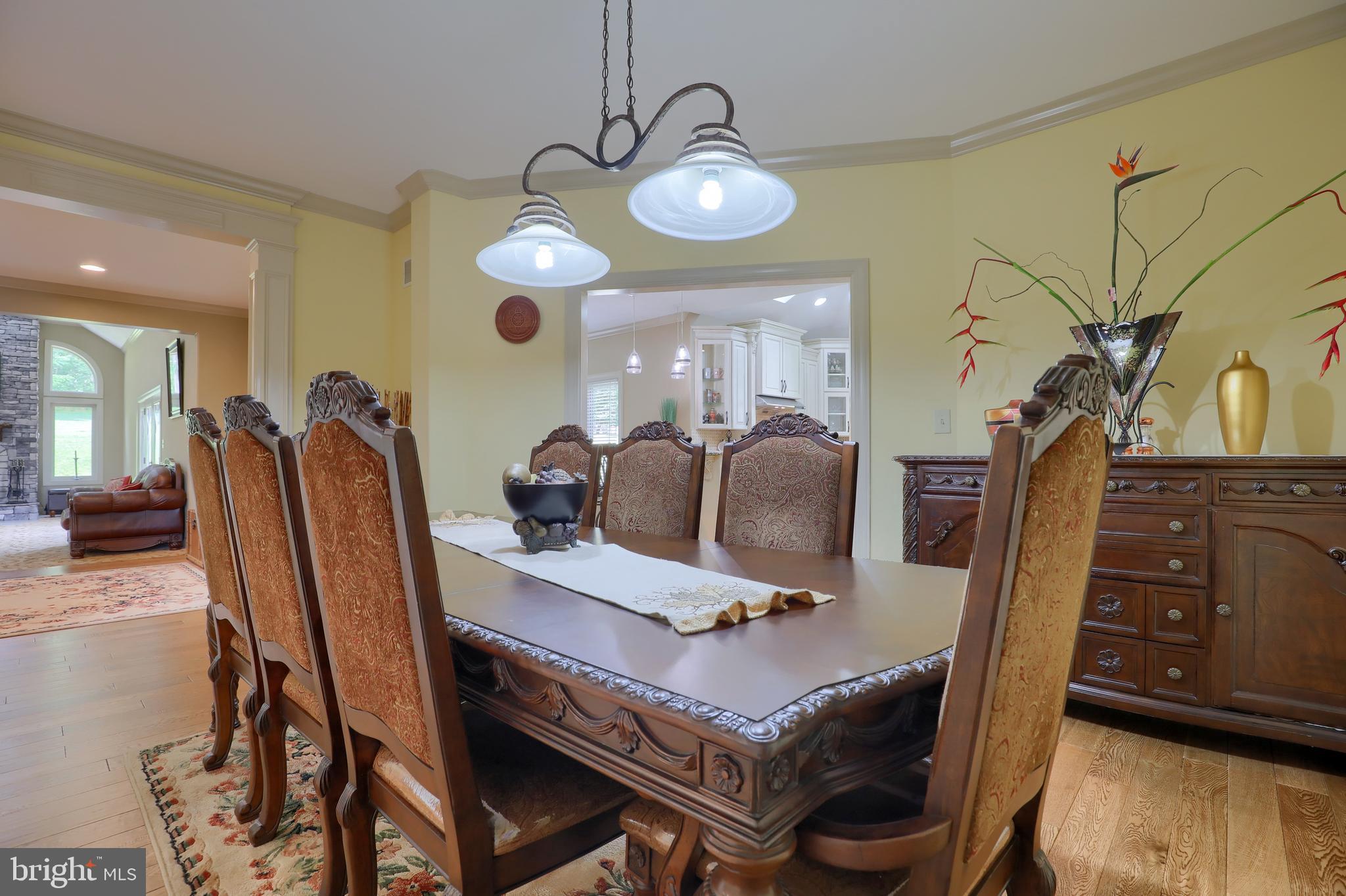 70 Horseshoe Trail Road Denver, PA 17517 - Photo 30 of 128 a view of a dining room with furniture and wooden floor