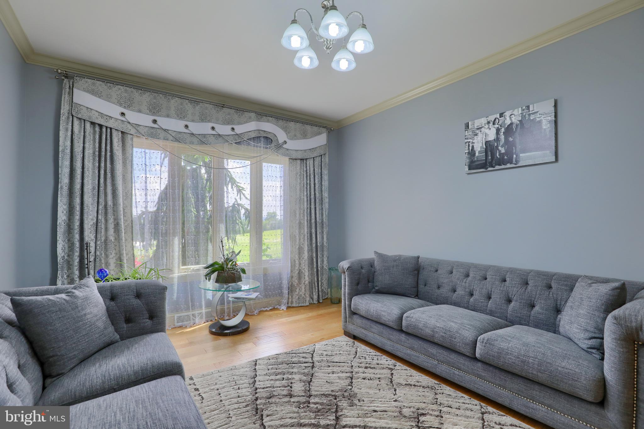 70 Horseshoe Trail Road Denver, PA 17517 - Photo 47 of 128 a living room with furniture and a large window