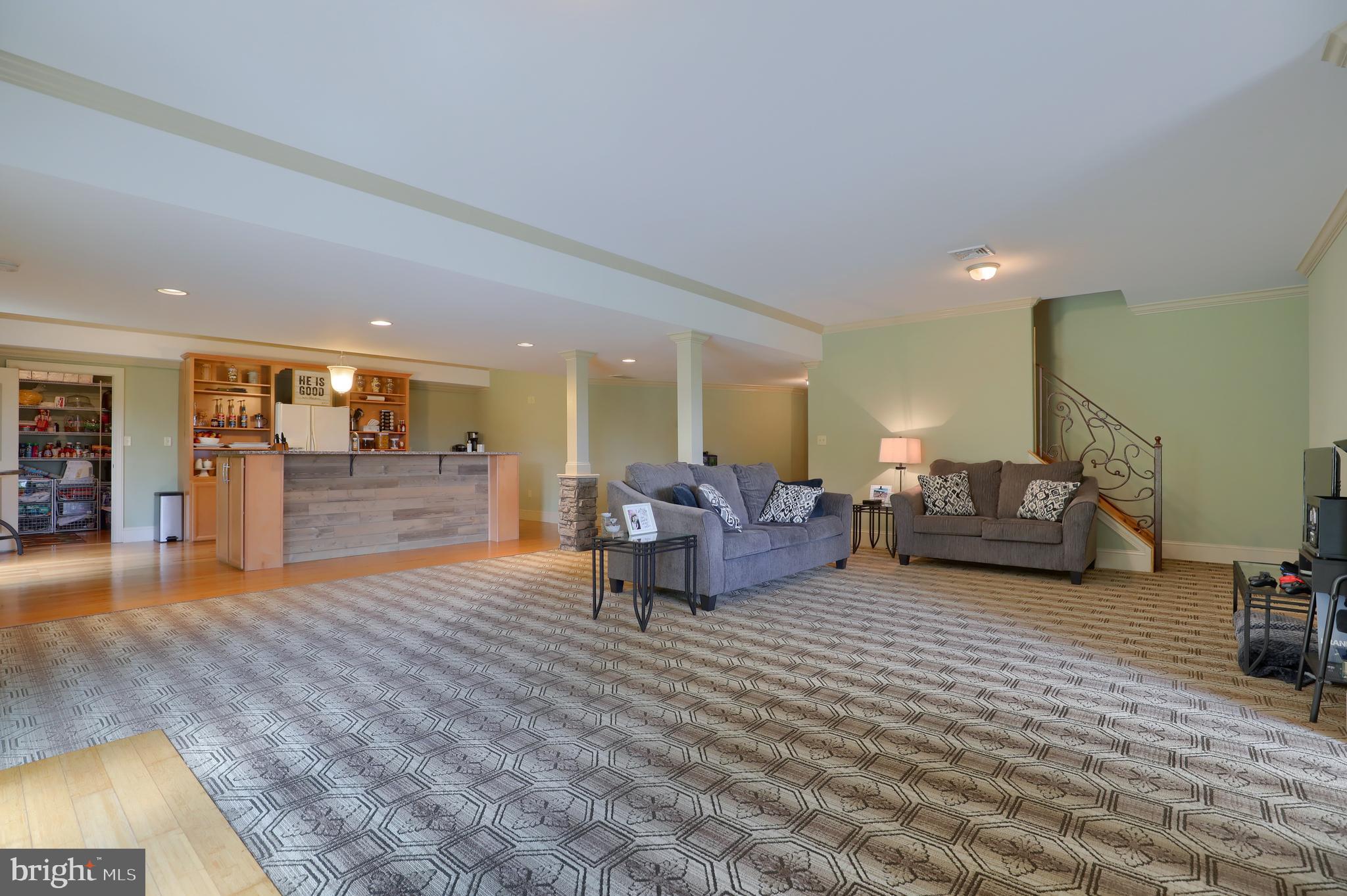 70 Horseshoe Trail Road Denver, PA 17517 - Photo 81 of 128 a living room with furniture and kitchen view