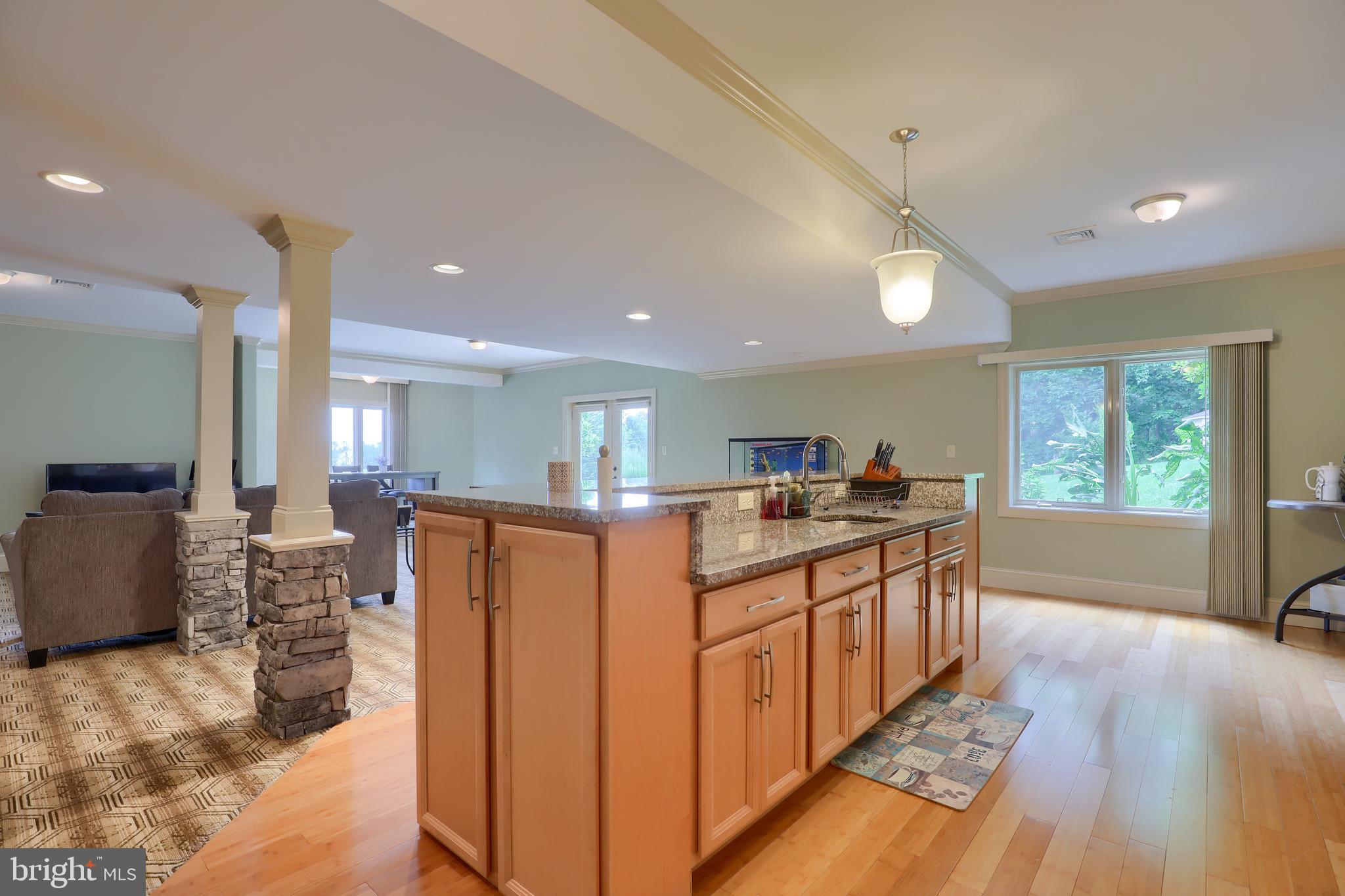 70 Horseshoe Trail Road Denver, PA 17517 - Photo 84 of 128 a kitchen with stainless steel appliances granite countertop a refrigerator and a stove top oven