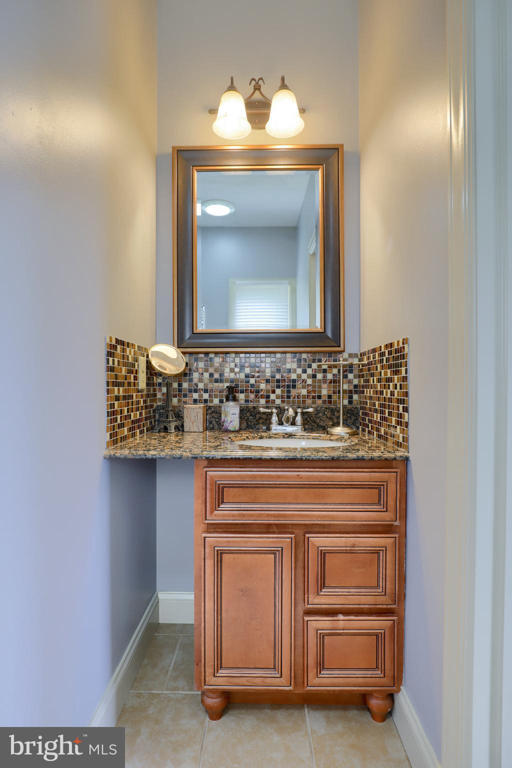 70 Horseshoe Trail Road Denver, PA 17517 - Photo 86 of 128 a bathroom with a sink and a mirror