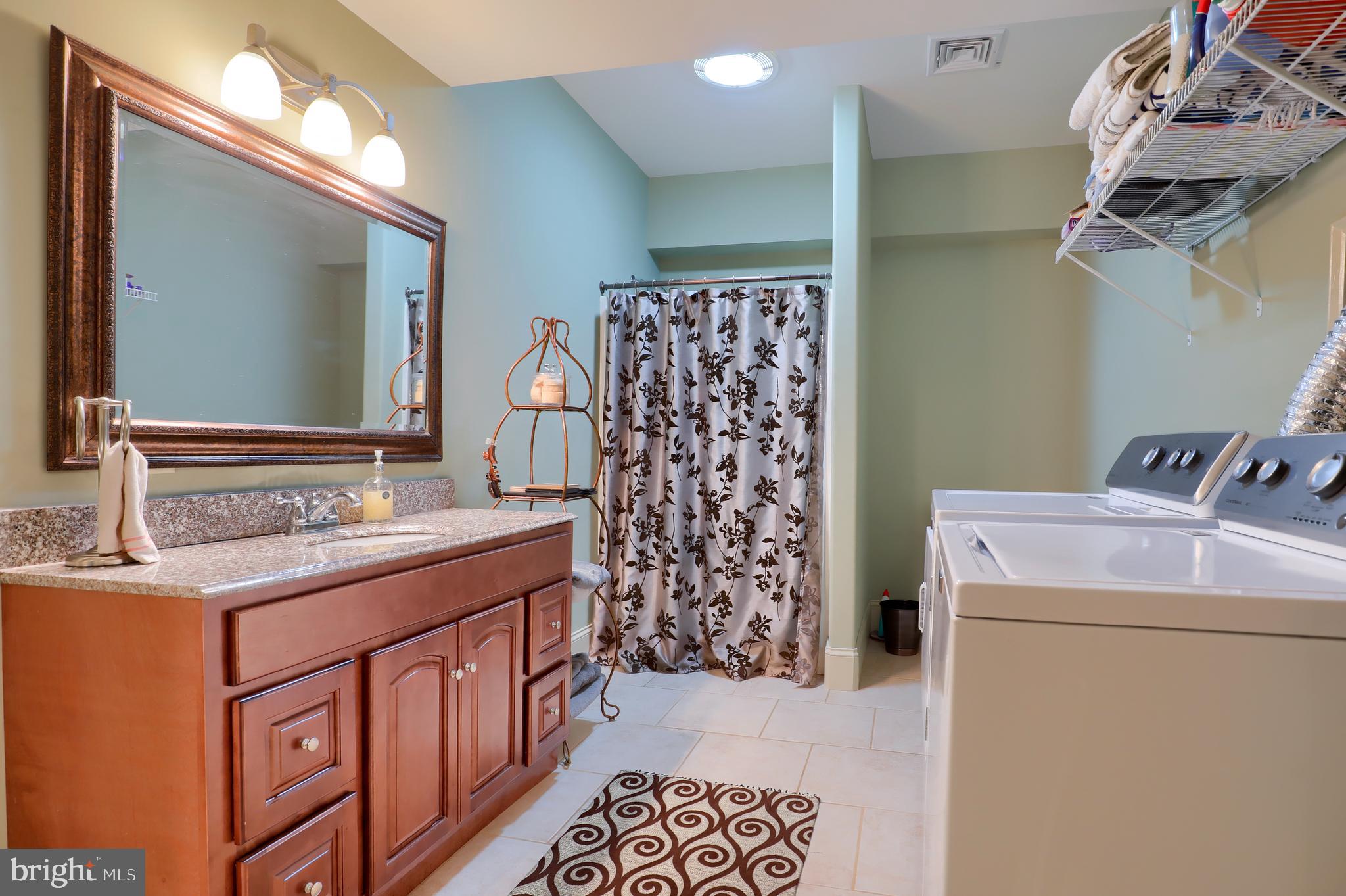 70 Horseshoe Trail Road Denver, PA 17517 - Photo 92 of 128 a bathroom with a sink and a mirror