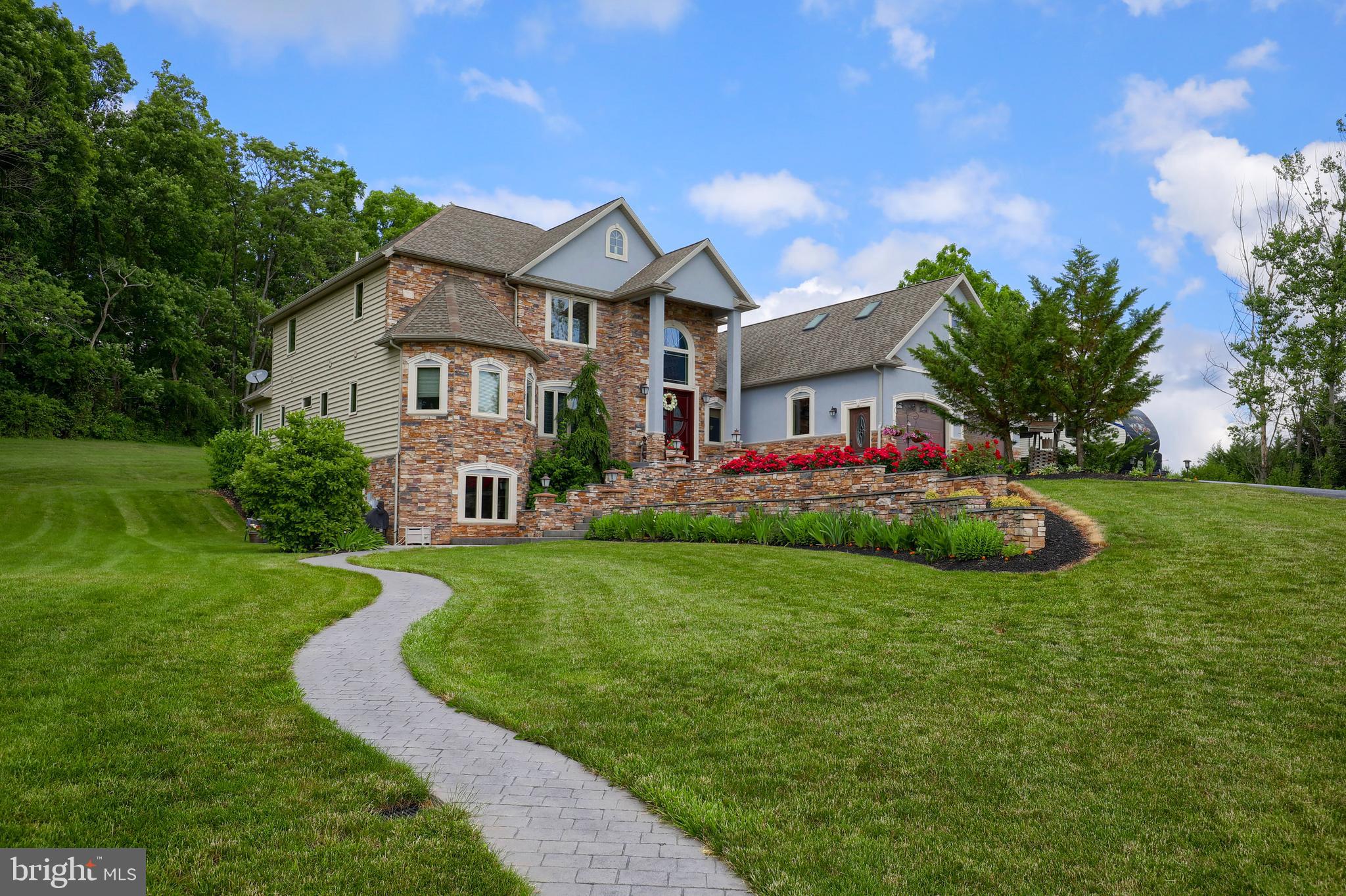 70 Horseshoe Trail Road Denver, PA 17517 - Photo 98 of 128 a front view of house with yard and green space