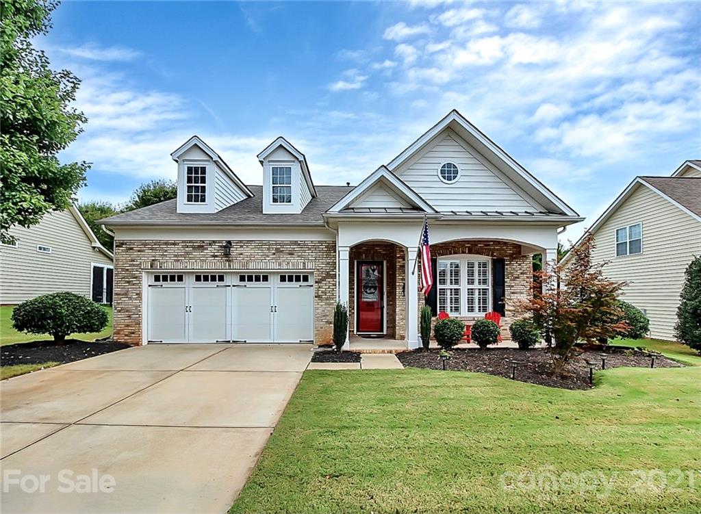 2018 Dynasty Court Fort Mill, SC 29708 - Photo 1 of 31 a front view of a house with garden
