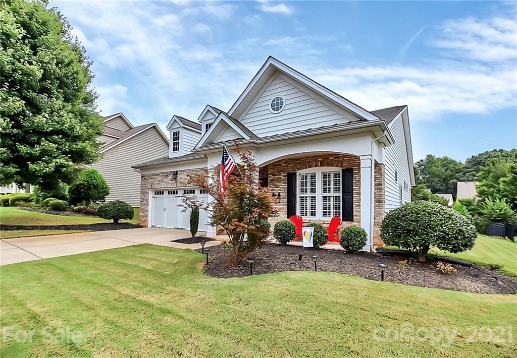 2018 Dynasty Court Fort Mill, SC 29708 - Photo 29 of 31 a view of a house with swimming pool and porch