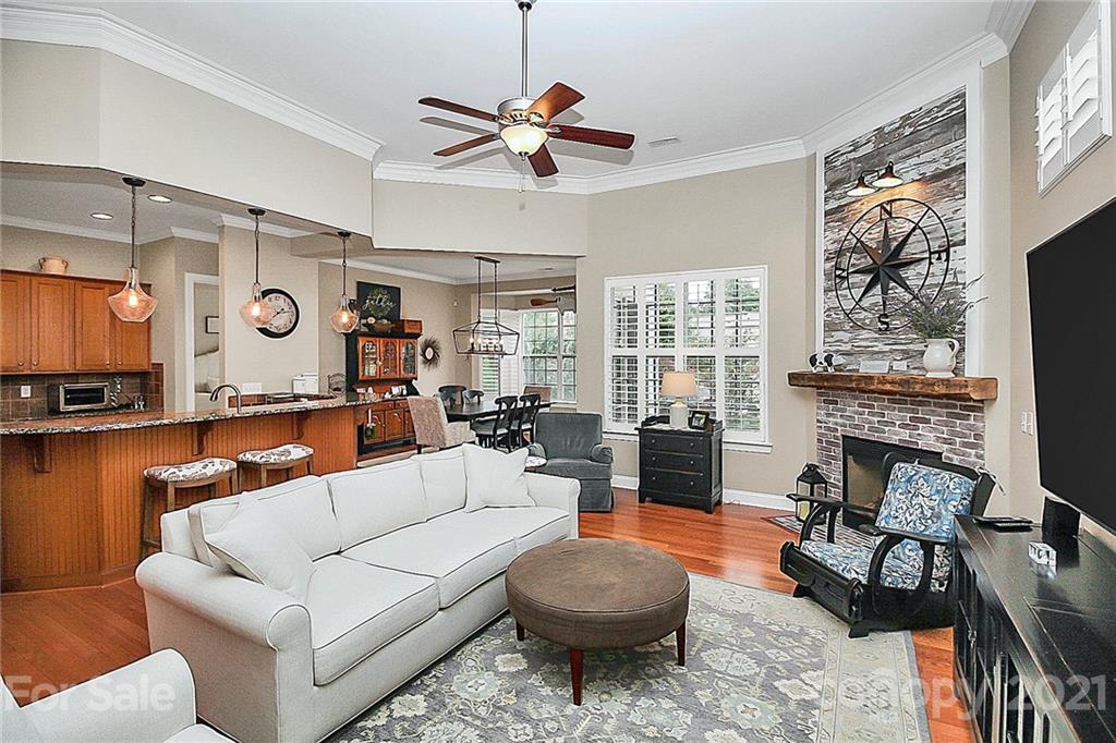 2018 Dynasty Court Fort Mill, SC 29708 - Photo 5 of 31 a living room with furniture and a fireplace
