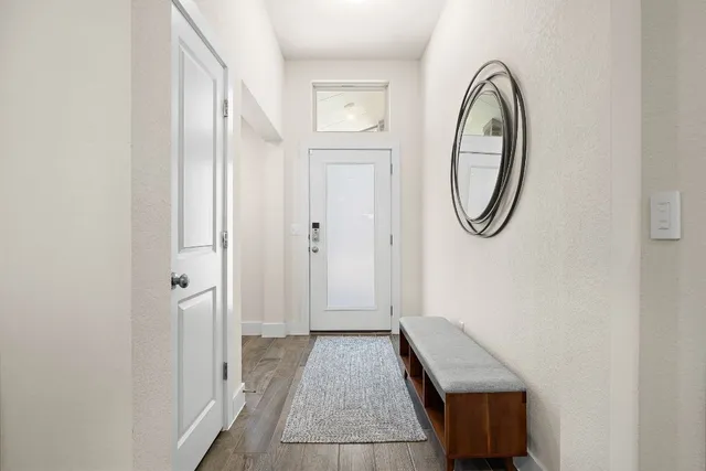 a view of a hallway with entryway