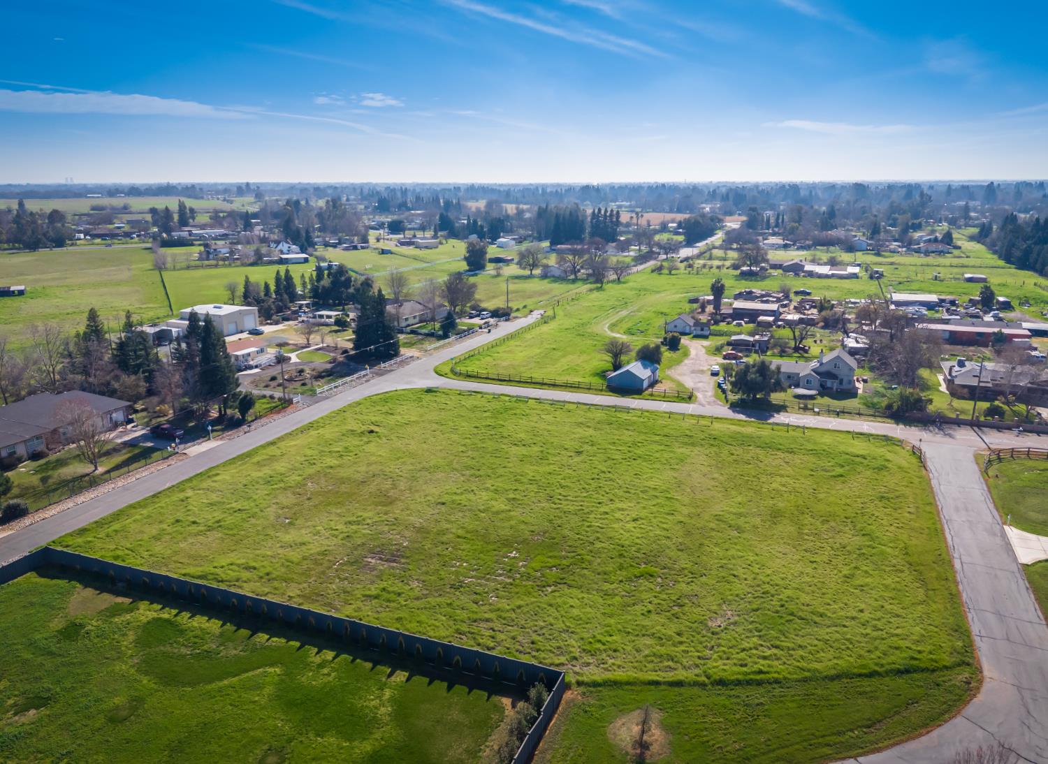 10685 Halfway Road Elk Grove, CA 95624 - Photo 3 of 19 a view of a swimming pool and a chairs