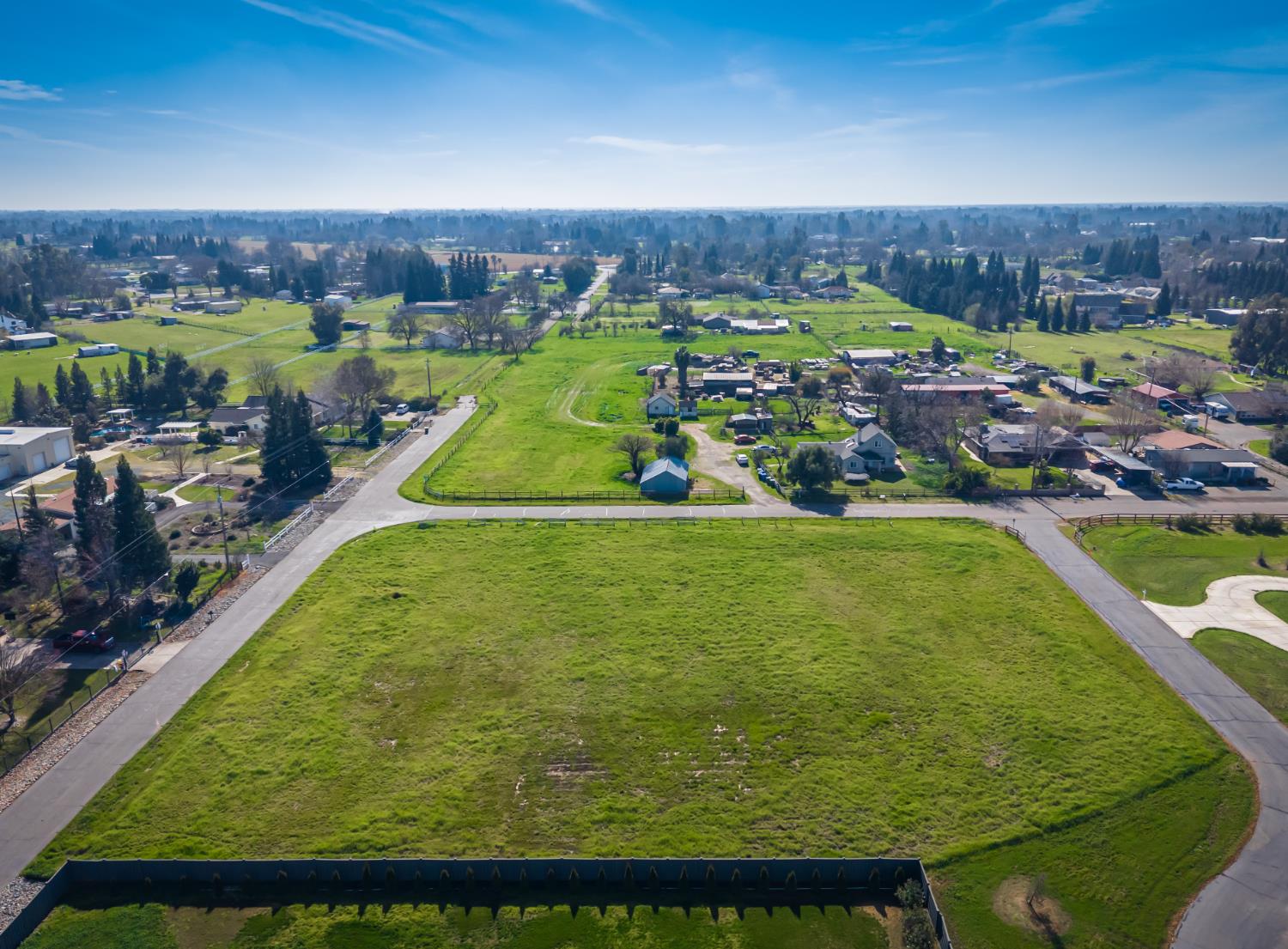 10685 Halfway Road Elk Grove, CA 95624 - Photo 9 of 19 a view of a lake with a yard