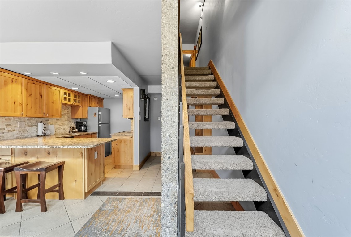 601 Village Road, Unit 501 Breckenridge, CO 80424 - Photo 14 of 50 a view of entryway and kitchen