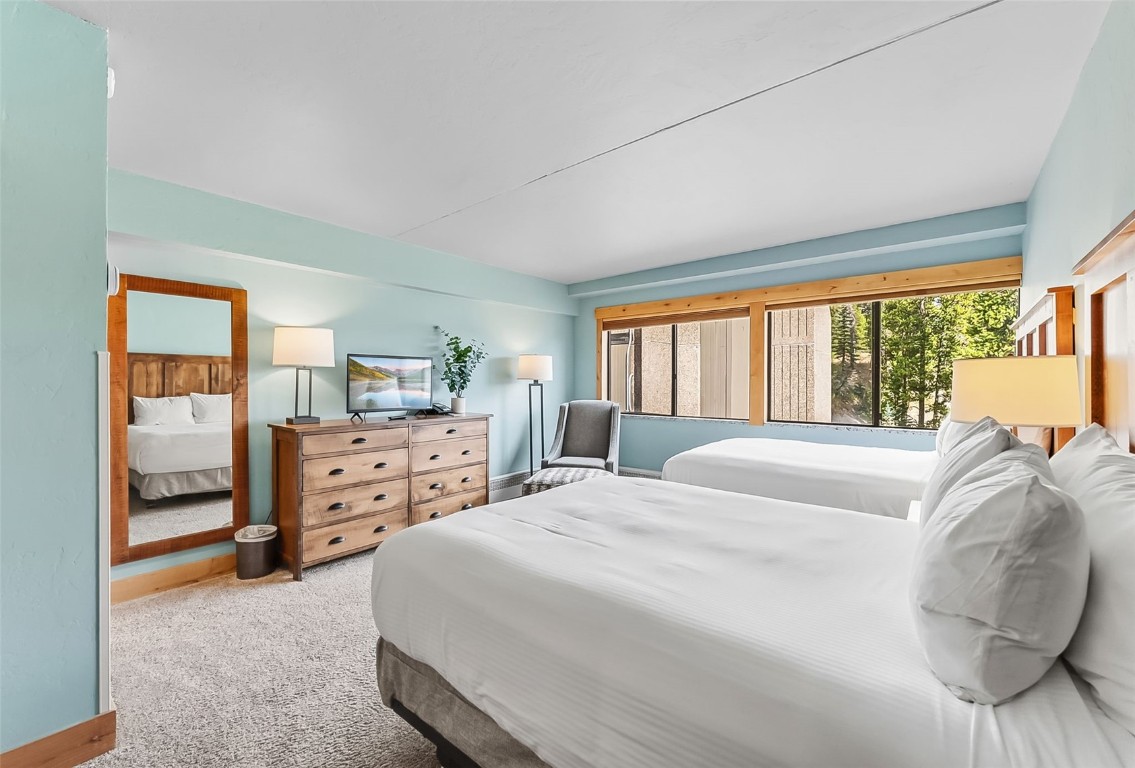 601 Village Road, Unit 501 Breckenridge, CO 80424 - Photo 20 of 50 a bedroom with a bed and a large window