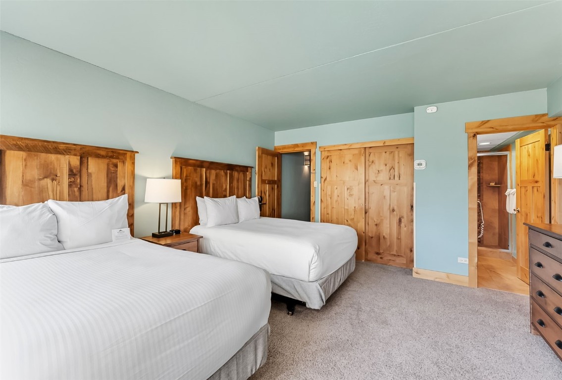 601 Village Road, Unit 501 Breckenridge, CO 80424 - Photo 21 of 50 a bedroom with two beds and large closet