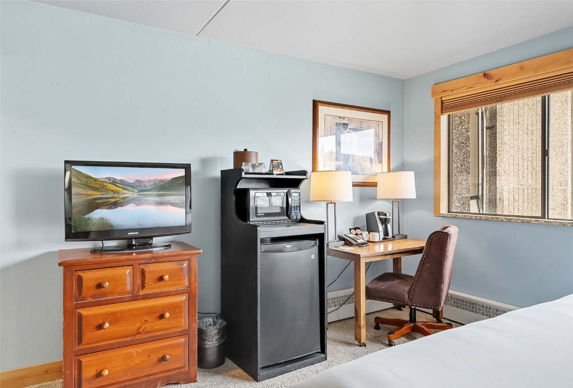 601 Village Road, Unit 501 Breckenridge, CO 80424 - Photo 34 of 50 a dining room with furniture and window