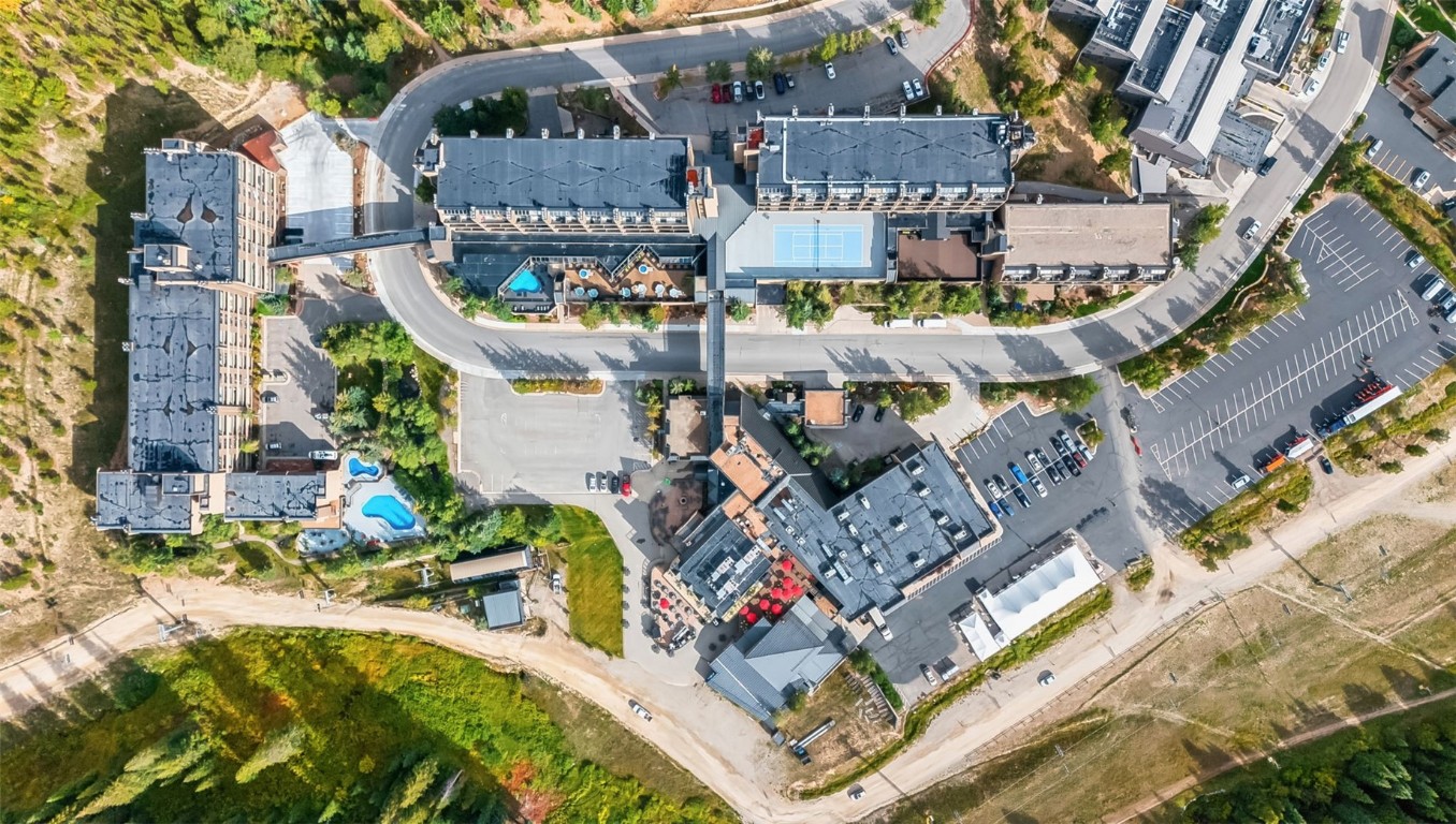 601 Village Road, Unit 501 Breckenridge, CO 80424 - Photo 42 of 50 an aerial view of a house with a swimming pool