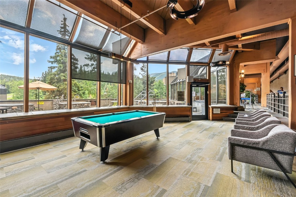 601 Village Road, Unit 501 Breckenridge, CO 80424 - Photo 50 of 50 a room with pool table and windows