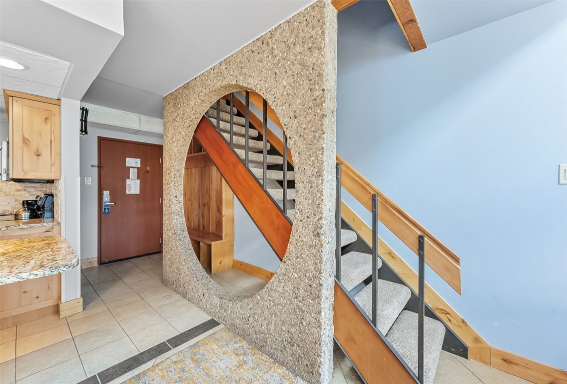 601 Village Road, Unit 501 Breckenridge, CO 80424 - Photo 8 of 50 a view of an entryway with staircase