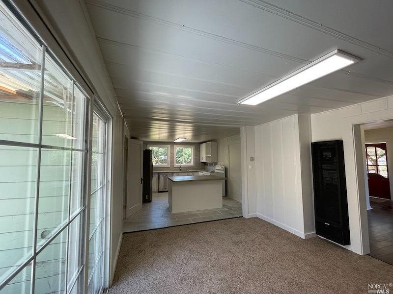 5773 Melita Road Santa Rosa, CA 95409 - Photo 12 of 13 a view of a kitchen and a windows