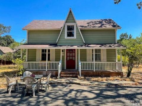 5773 Melita Road Santa Rosa, CA 95409 - Photo 2 of 13 a front view of a house with a yard