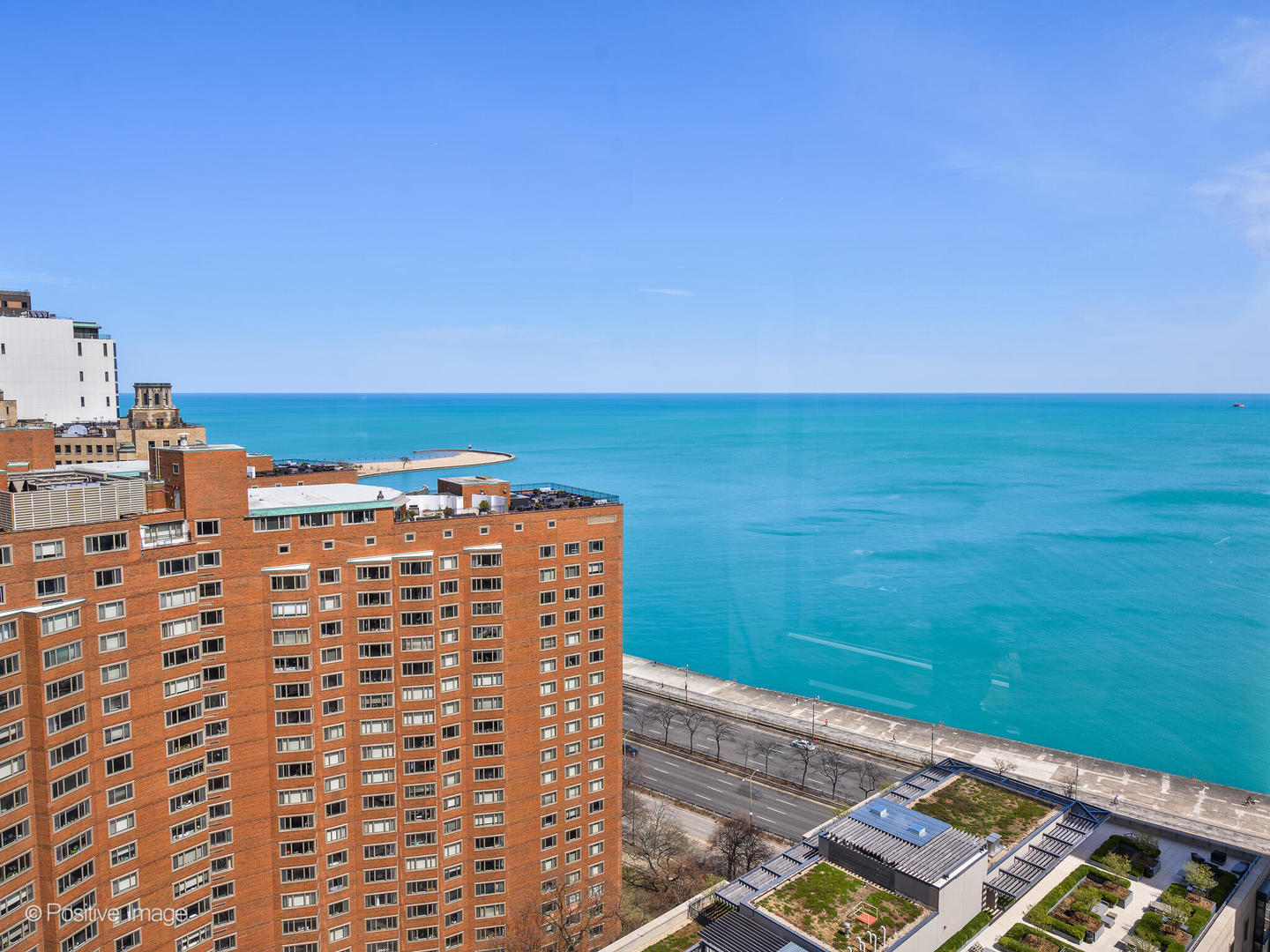 1310 North Ritchie Court, Unit 27C Chicago, IL 60610 - Photo 26 of 30 a view of a balcony with an ocean