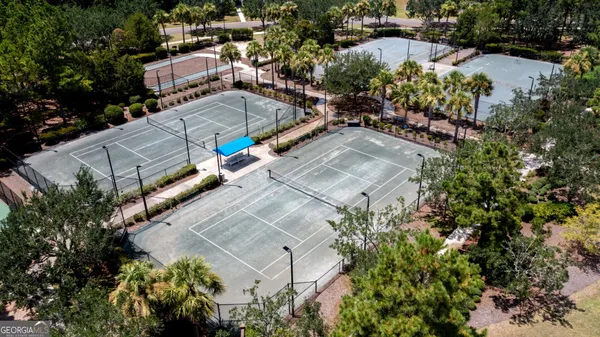 an aerial view of a house with a garden