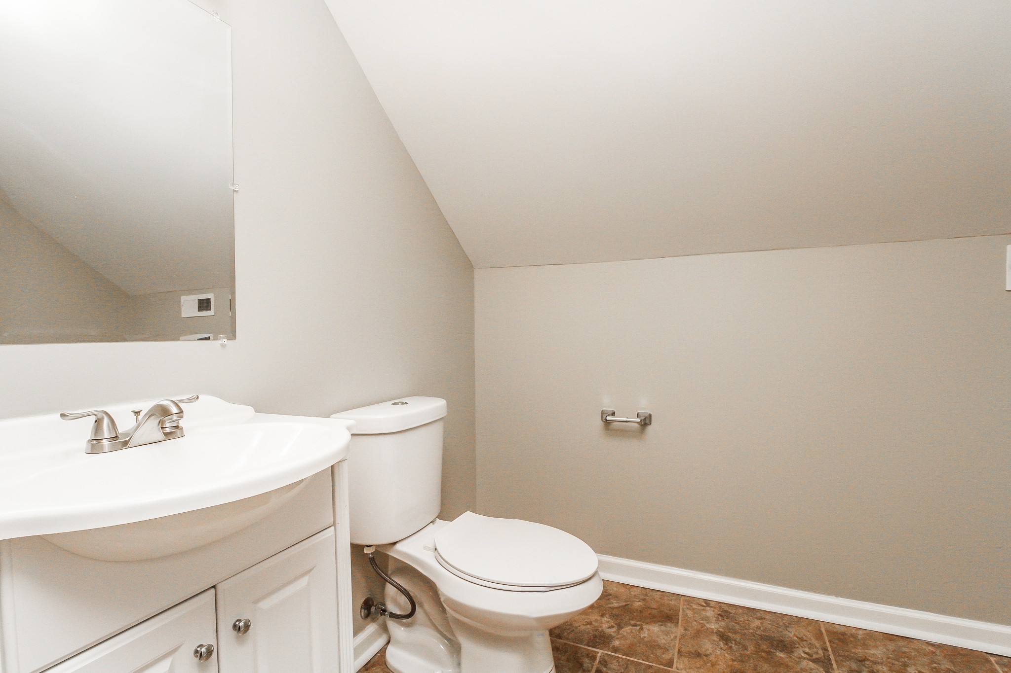2921 Stapleton Drive Spring Hill, TN 37174 - Photo 14 of 17 a bathroom with a sink a toilet and a mirror