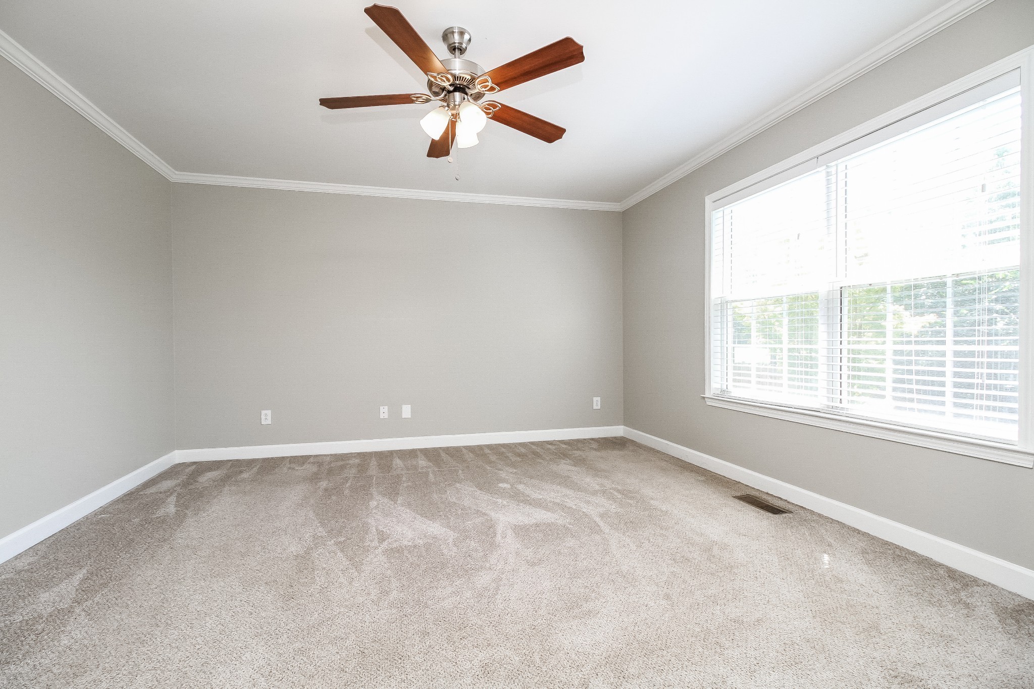 2921 Stapleton Drive Spring Hill, TN 37174 - Photo 8 of 17 an empty room with a window and a ceiling fan