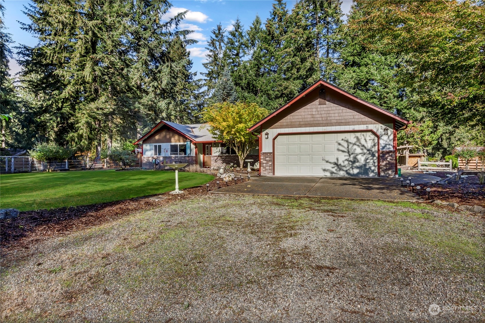 5412 133rd Avenue Southwest Rochester, WA 98579 - Photo 3 of 31 a house view with a garden space