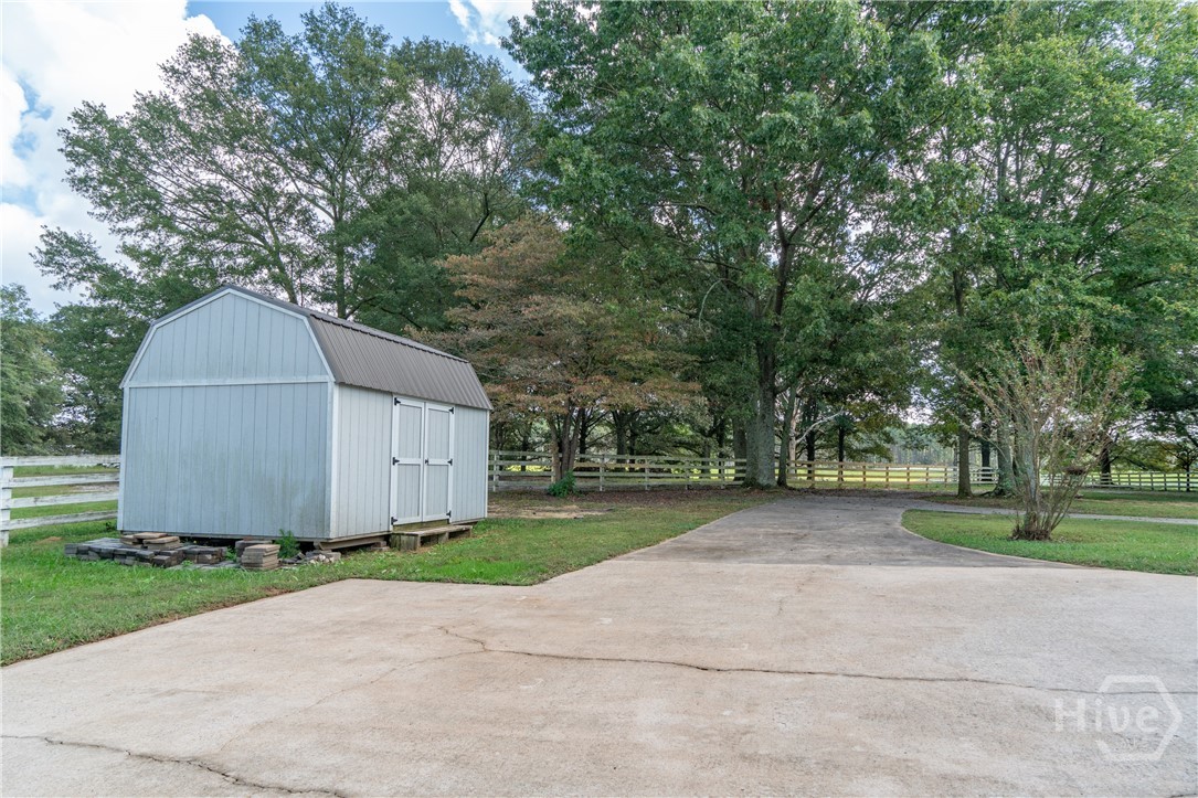1963 Rehoboth Road Bowman, GA 30624 - Photo 14 of 64 Parking pad and shed