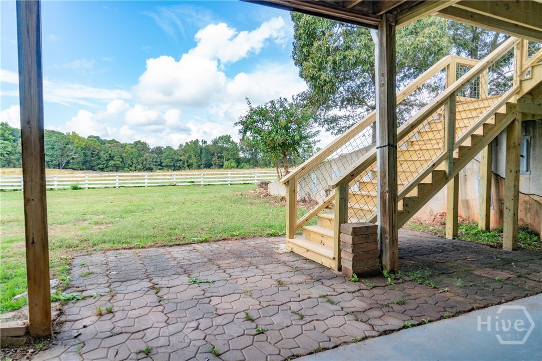 1963 Rehoboth Road Bowman, GA 30624 - Photo 22 of 64 Back porch stairs from basement
