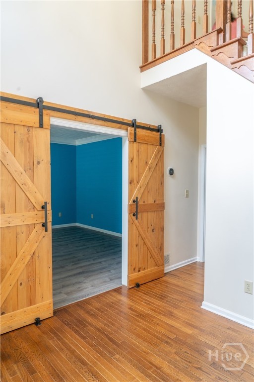 1963 Rehoboth Road Bowman, GA 30624 - Photo 29 of 64 Foyer + Barn door to bonus room