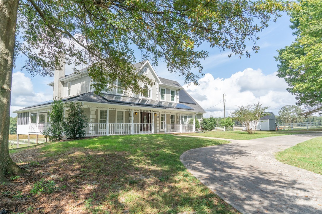 1963 Rehoboth Road Bowman, GA 30624 - Photo 3 of 64 Driveway approaching house