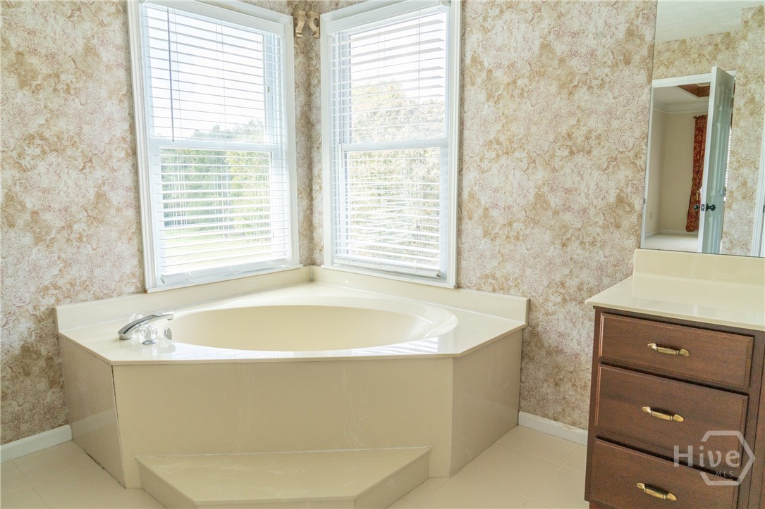 1963 Rehoboth Road Bowman, GA 30624 - Photo 37 of 64 Primary bathroom garden tub