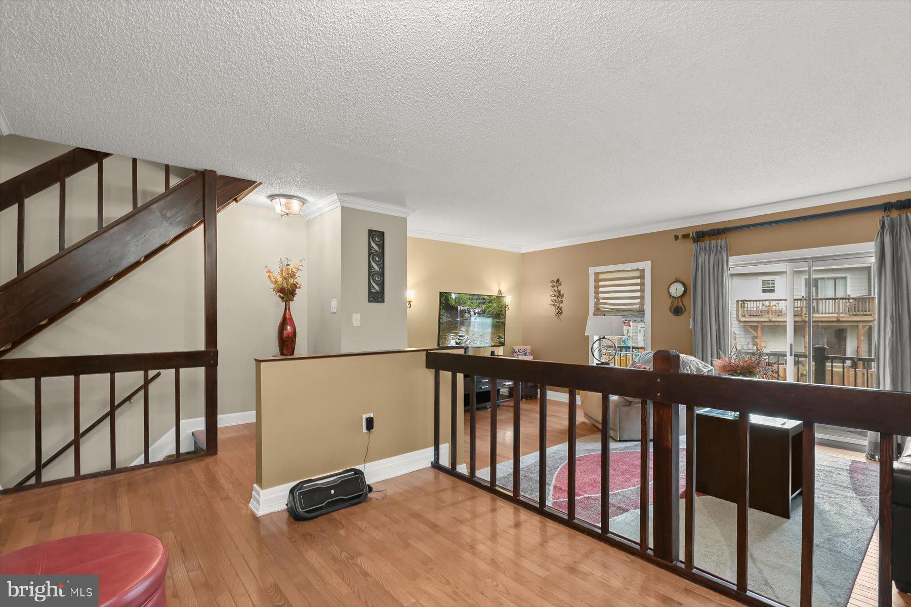 737 St Michaels Drive Bowie, MD 20721 - Photo 15 of 41 a view of a porch with wooden floor and windows