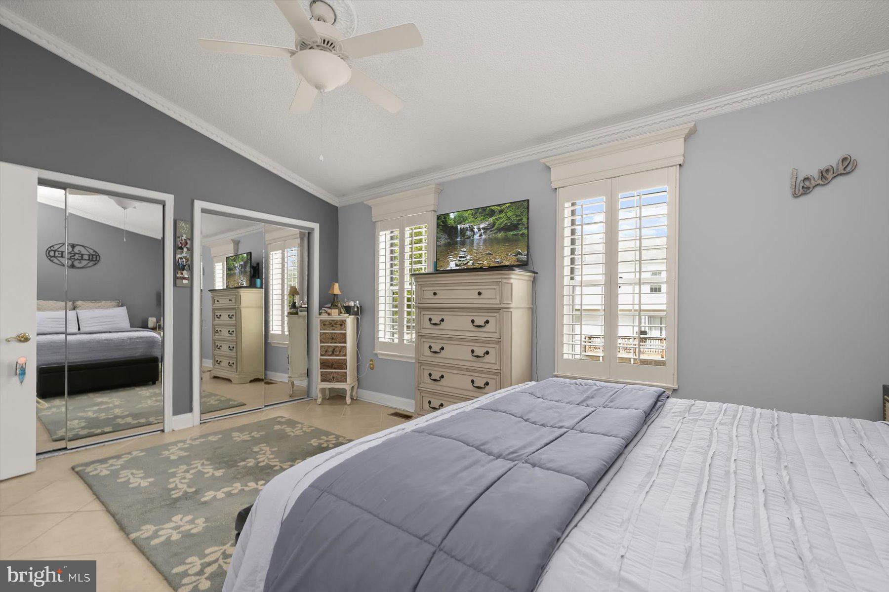 737 St Michaels Drive Bowie, MD 20721 - Photo 25 of 41 a bedroom with a large bed and a window