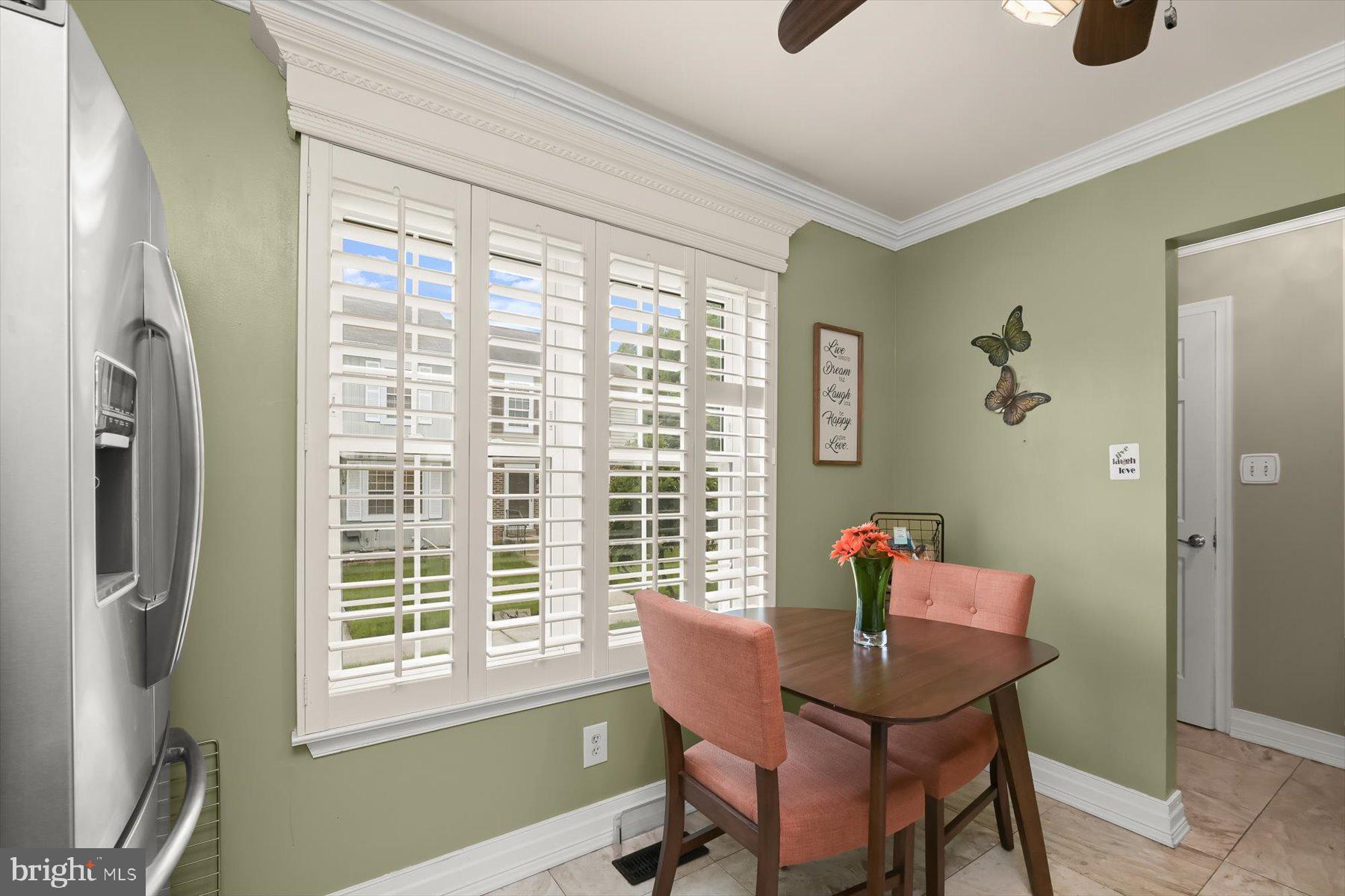 737 St Michaels Drive Bowie, MD 20721 - Photo 7 of 41 a dining room with furniture and a window