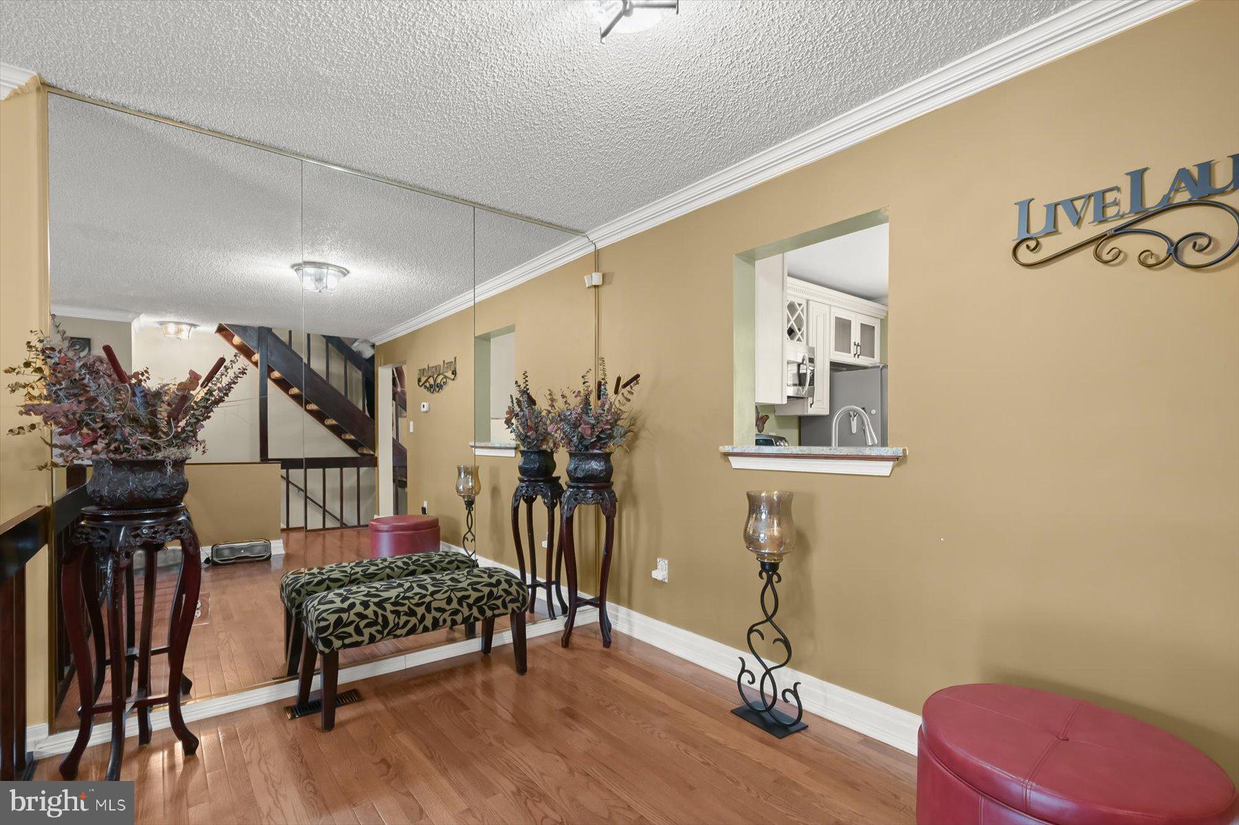 737 St Michaels Drive Bowie, MD 20721 - Photo 10 of 41 a bedroom with filled with furniture and gym equipment