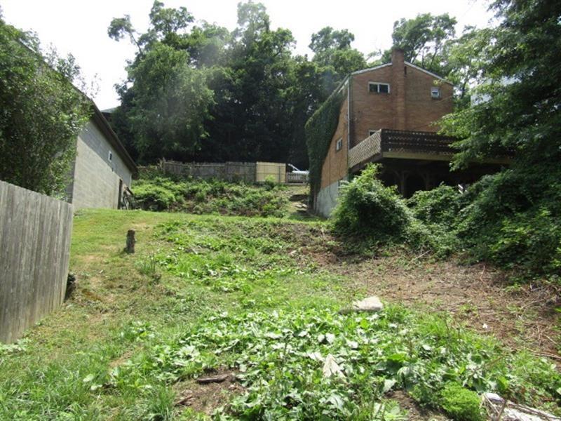 7231 Baker Street Pittsburgh, PA 15206 - Photo 2 of 4 a aerial view of a house with a yard and plants