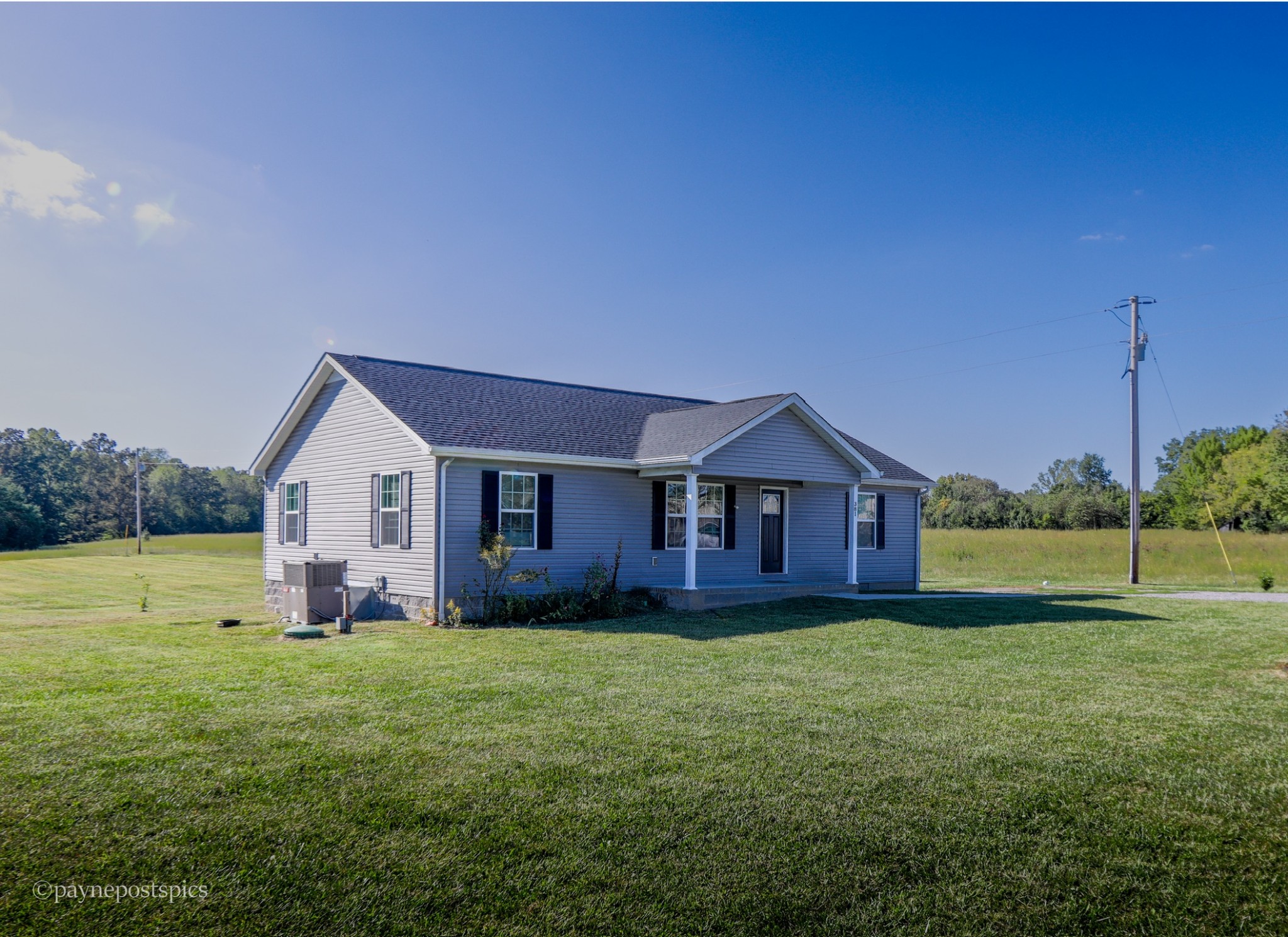 381 Bethany Road McMinnville, TN 37110 - Photo 1 of 18 a view of a house with a yard and a large tree