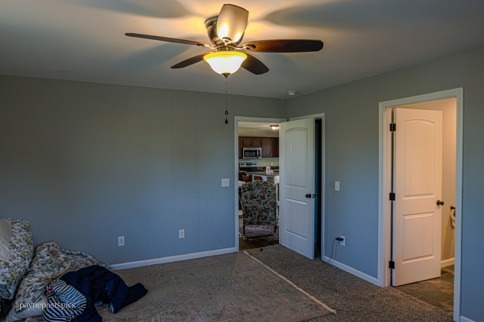 381 Bethany Road McMinnville, TN 37110 - Photo 13 of 18 a view of a livingroom with a chandelier fan