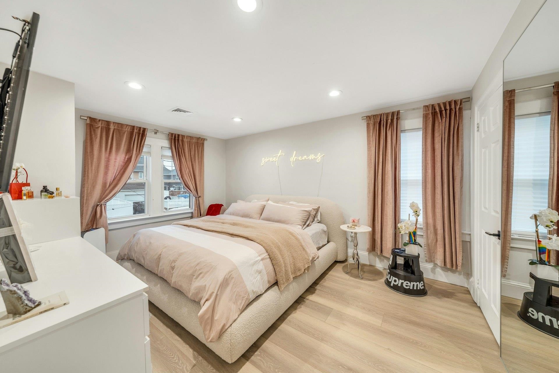 67 Hillcrest Road Kearny, NJ 07032 - Photo 12 of 30 a spacious bedroom with a large bed and a large window