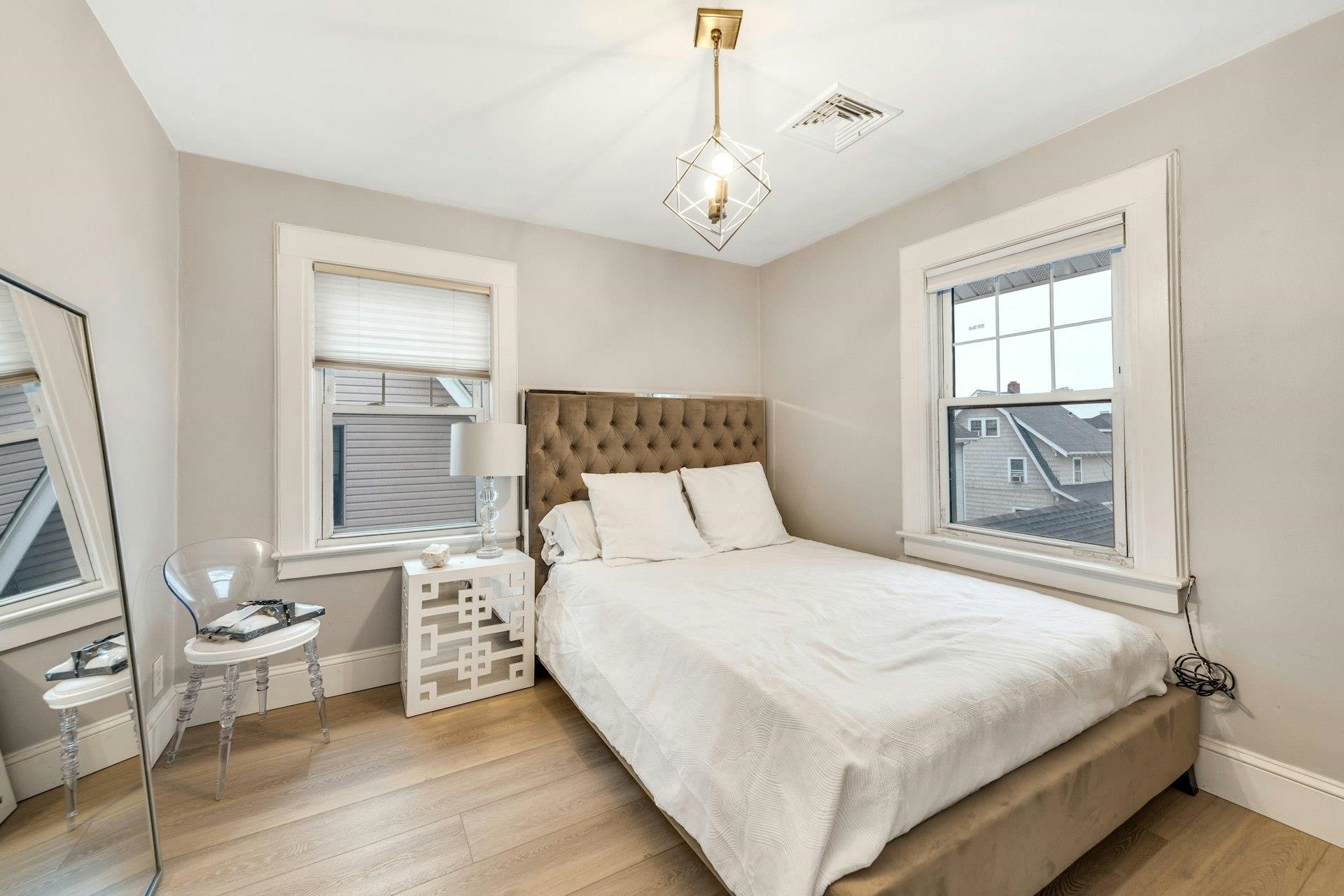 67 Hillcrest Road Kearny, NJ 07032 - Photo 15 of 30 a bedroom with a large bed and a window