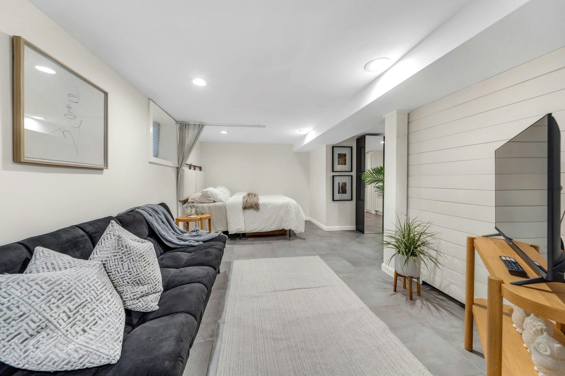 67 Hillcrest Road Kearny, NJ 07032 - Photo 21 of 30 a living room with furniture a couch and potted plant
