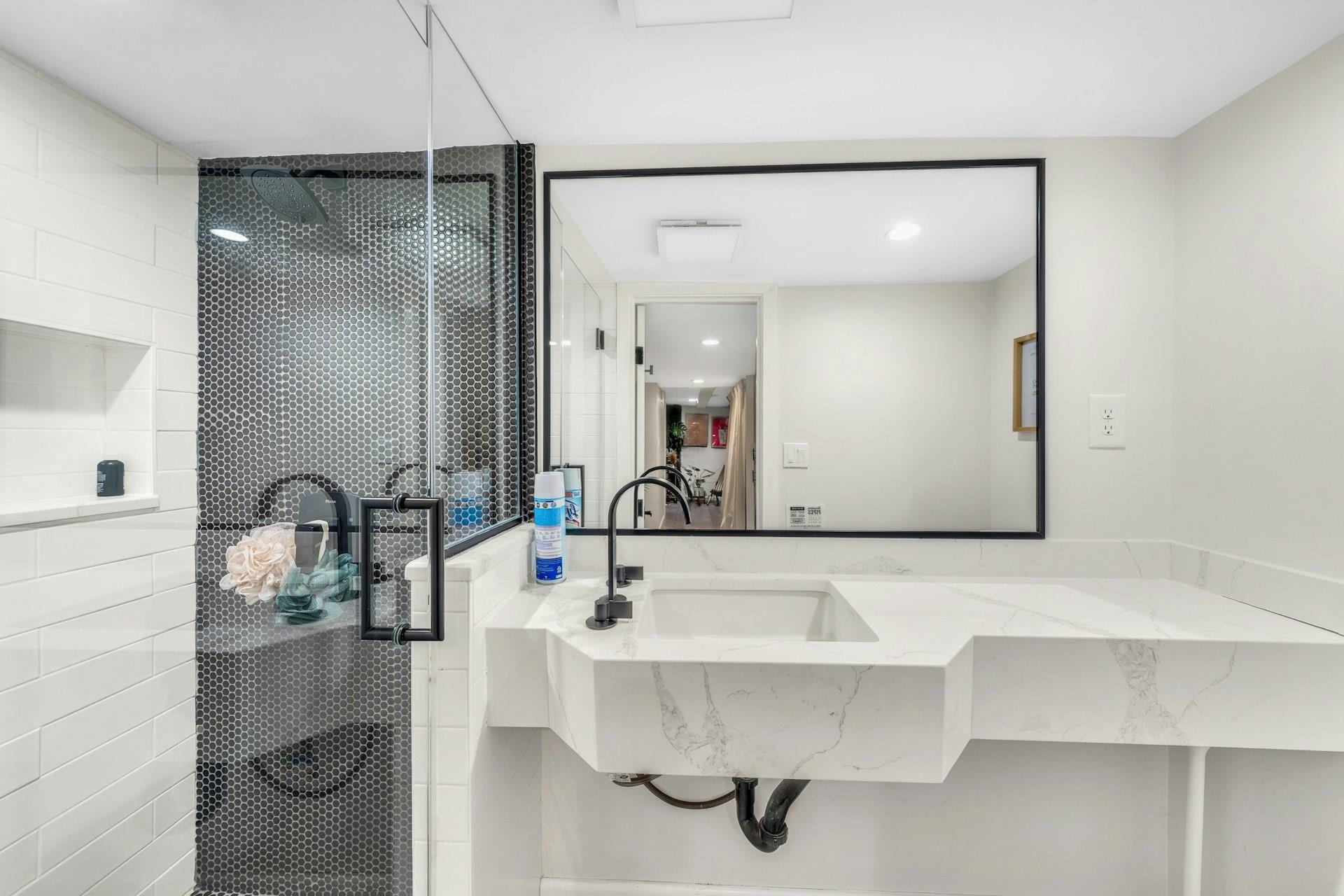 67 Hillcrest Road Kearny, NJ 07032 - Photo 25 of 30 a bathroom with a sink and a mirror