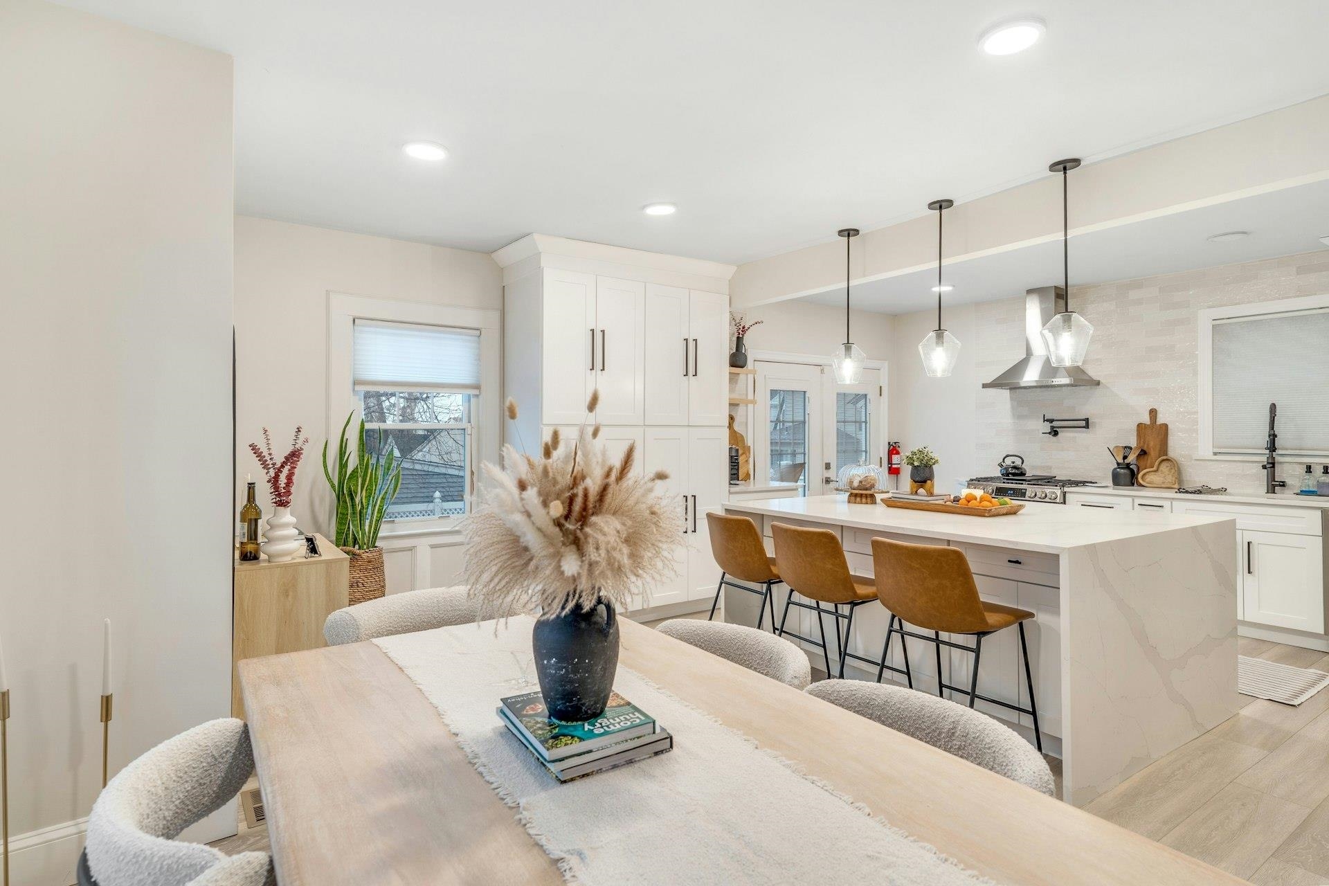 67 Hillcrest Road Kearny, NJ 07032 - Photo 7 of 30 a kitchen with a table chairs refrigerator and microwave