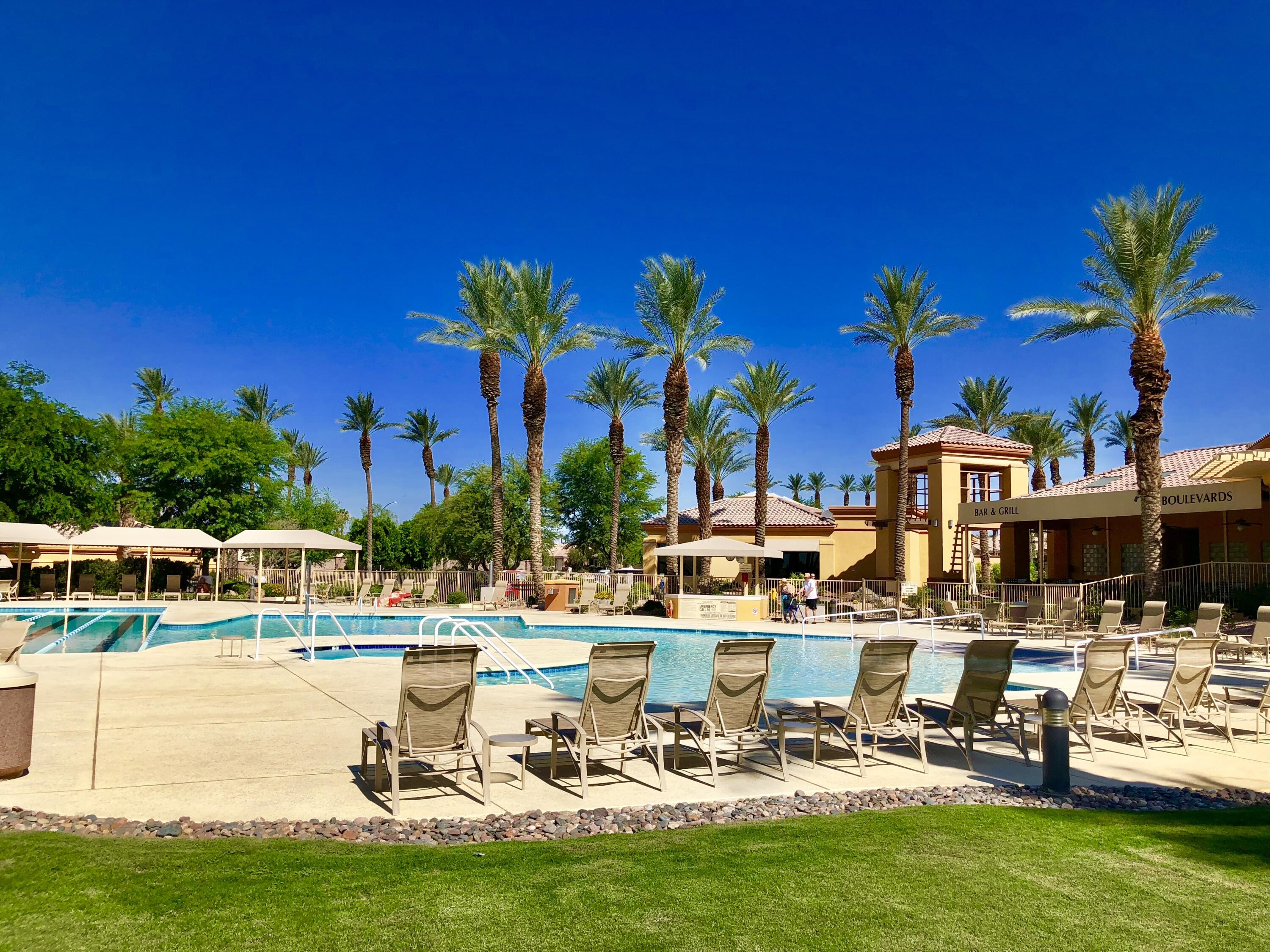 78376 Moongold Road Palm Desert, CA 92211 - Photo 23 of 36 a view of a lake with houses