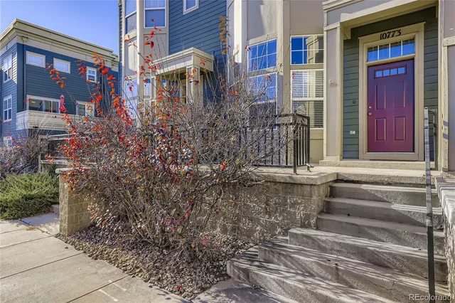 a view of a building with a door and windows
