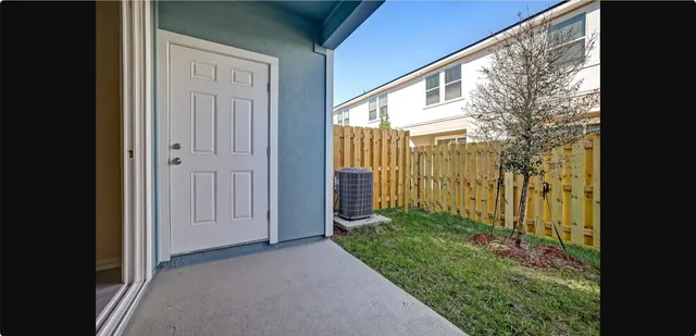 a view of a garden from a balcony