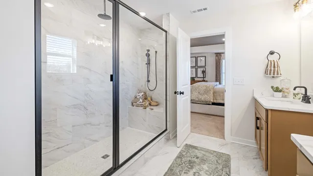 a bathroom with a tub shower and sink